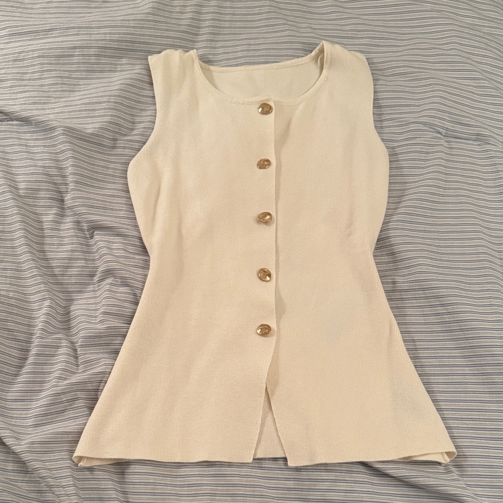 White knit top with gold buttons